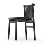 Featuring Baden Sonoma Black Dining Chair by Four Hands at Amethyst Home. Midcentury-inspired with its minimalist wooden frame, this armless dining chair features a low back and float-like seat upholstered in slightly distressed black top-grain leather exclusive to Four Hands. Leather wrap detailing for texture.Overall Dimensions: 19.75"w x 23.25"d x 32.25"hWei. Amethyst Home provides interior design, new home construction design consulting, vintage area rugs, and lighting in the Miami metro area.