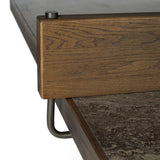 Fun meets flexibility. Two large slabs of warm grey marble, framed in rich oak, join together and sit atop the minimalist plinth bases of this dual-purpose ping pong table. The wooden "net" fastens to the table with custom gunmetal clamps, which can be easily removed for a dining table that seats 12 Amethyst Home provides interior design, new home construction design consulting, vintage area rugs, and lighting in the Houston metro area.