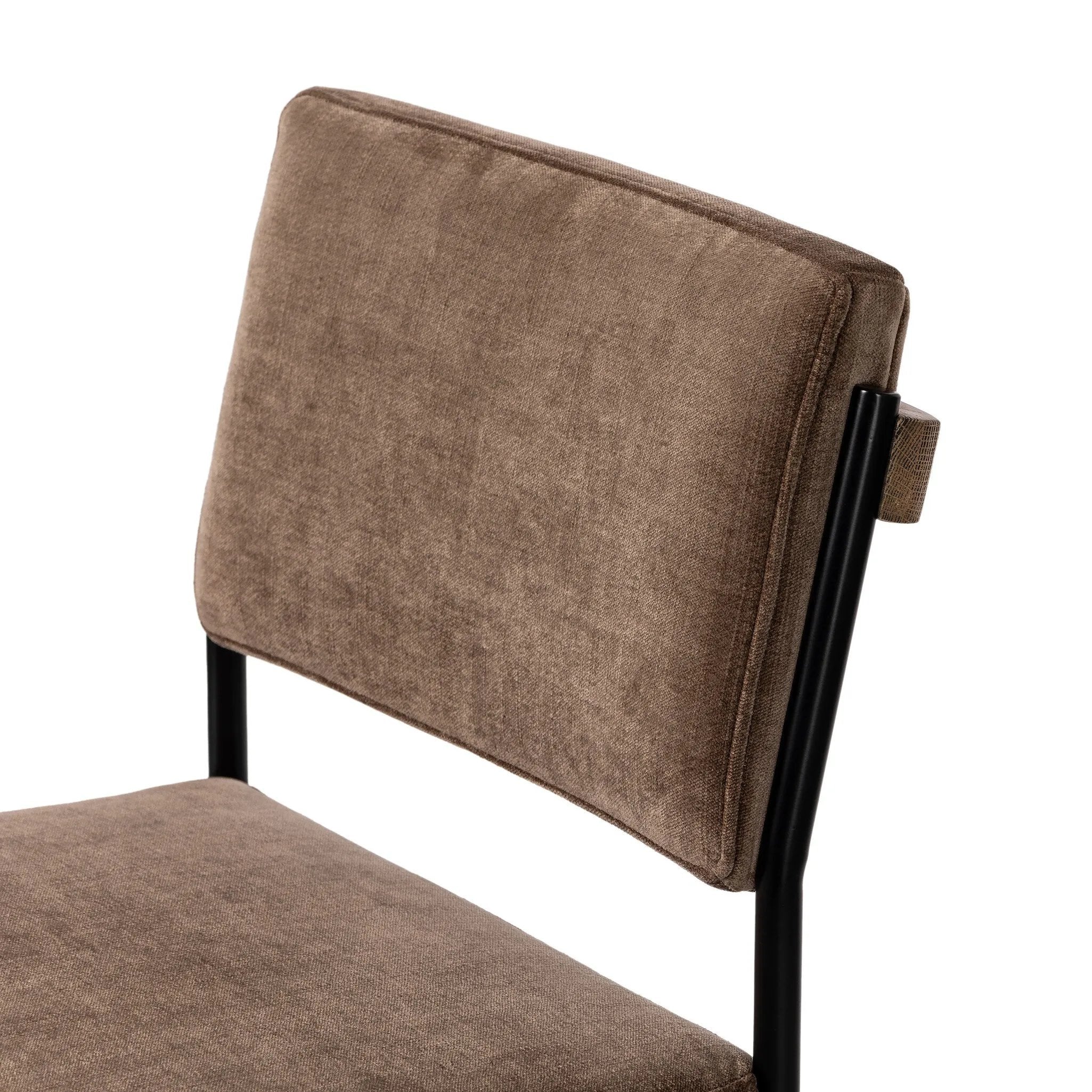 Bring a luxe, modern look to the table. Slim, black-finished iron forms an airy frame for black top-grain leather, with solid oak decking for an eye-catching material mix Amethyst Home provides interior design, new home construction design consulting, vintage area rugs, and lighting in the Des Moines metro area.