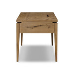 Featuring Bergstrom Warm Natural Oak Veneer Desk by Four Hands at Amethyst Home. Warm up your workspace with this light-finished writing desk of rich character oak. Tapered legs and subtle corner relief details create a simplified look that complements a home office or flex space. Complete with thoughtful touches like built-in cord management, a flip-top outlet. Amethyst Home provides interior design, new home construction design consulting, vintage area rugs, and lighting in the Tampa metro area.