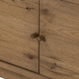 Featuring Bergstrom Warm Natural Oak Veneer Media Console by Four Hands at Amethyst Home. Light, natural oak reflects the New American inspiration behind this storage-driven console of warm, natural oak. Elevated on tapered legs with corner relief accents, its asymmetrical design offers storage for your media needs and more. Overall Dimensions: 84.00"w x 1. Amethyst Home provides interior design, new home construction design consulting, vintage area rugs, and lighting in the Des Moines metro area.