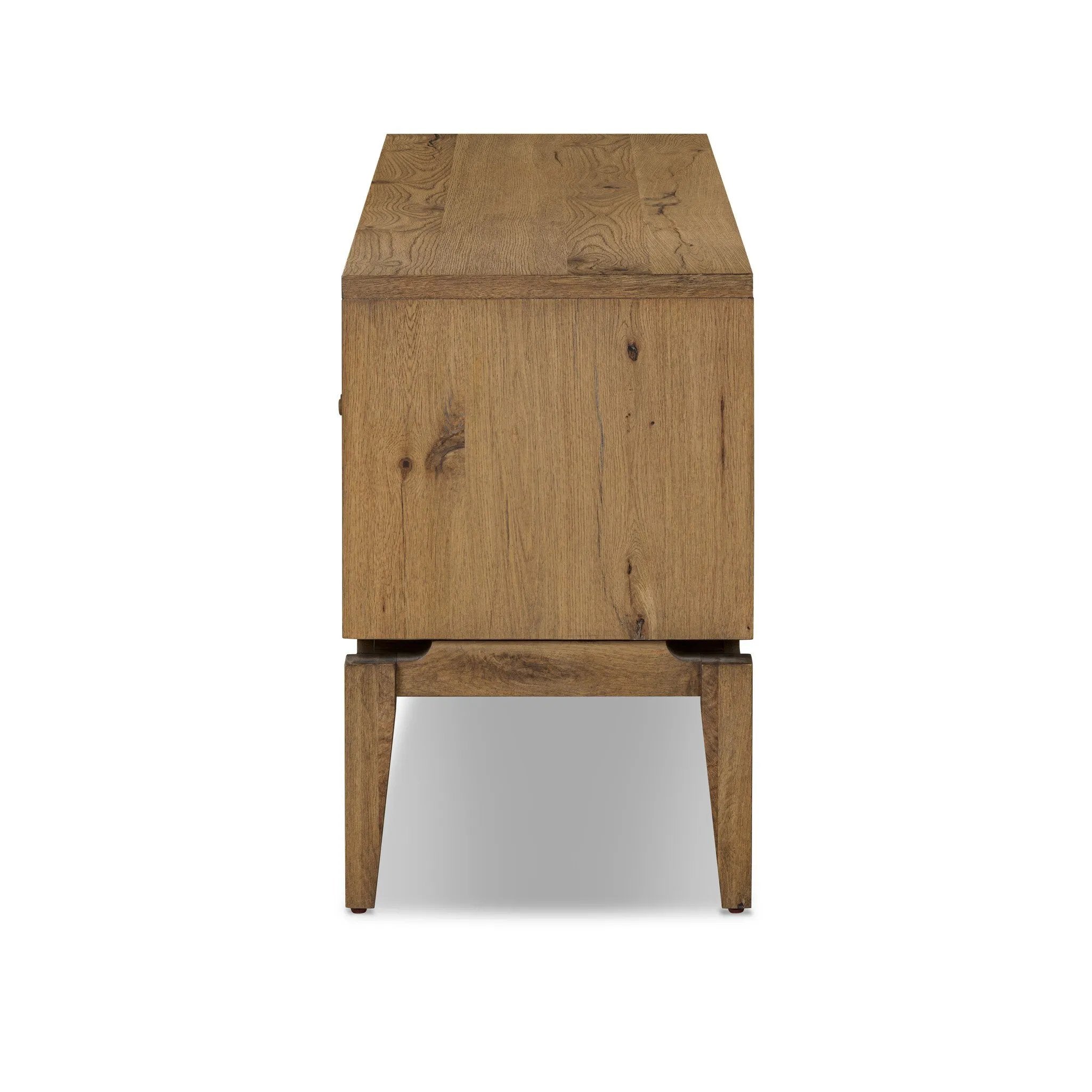 Featuring Bergstrom Warm Natural Oak Veneer Media Console by Four Hands at Amethyst Home. Light, natural oak reflects the New American inspiration behind this storage-driven console of warm, natural oak. Elevated on tapered legs with corner relief accents, its asymmetrical design offers storage for your media needs and more. Overall Dimensions: 84.00"w x 18. Amethyst Home provides interior design, new home construction design consulting, vintage area rugs, and lighting in the Park City metro area.