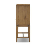 Featuring Bergstrom Warm Natural Oak Veneer Secretary Desk by Four Hands at Amethyst Home. A fresh take on the traditional secretary desk, made from warm natural oak. A flip-down top creates a wide writing surface, offering the perfect place to pen a handwritten note. Overall Dimensions: 35.00"w x 18.00"d x 48.00"h. Amethyst Home provides interior design, new home construction design consulting, vintage area rugs, and lighting in the Dallas metro area.