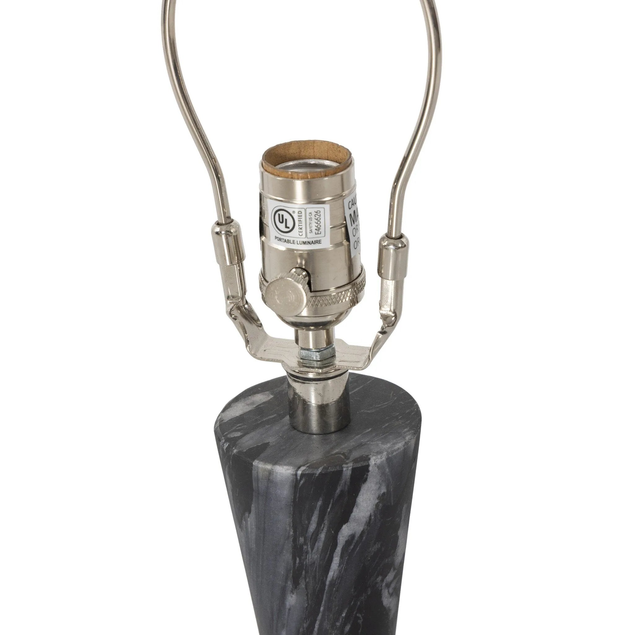 Featuring Bibianna Black Italian Marble Table Lamp by Four Hands at Amethyst Home. Polished forms define this sculptural table lamp, featuring a base of black Italian marble with distinctive white veining and a tapered flax linen shade.
Overall Dimensions: 20.0" L x 20.0 " W x 24.5" H
Materials: Solid Marble, Stainless Steel, ThermoplasticWeight: 12.21 lbs. Amethyst Home provides interior design, new home construction design consulting, vintage area rugs, and lighting in the Boston metro area.
