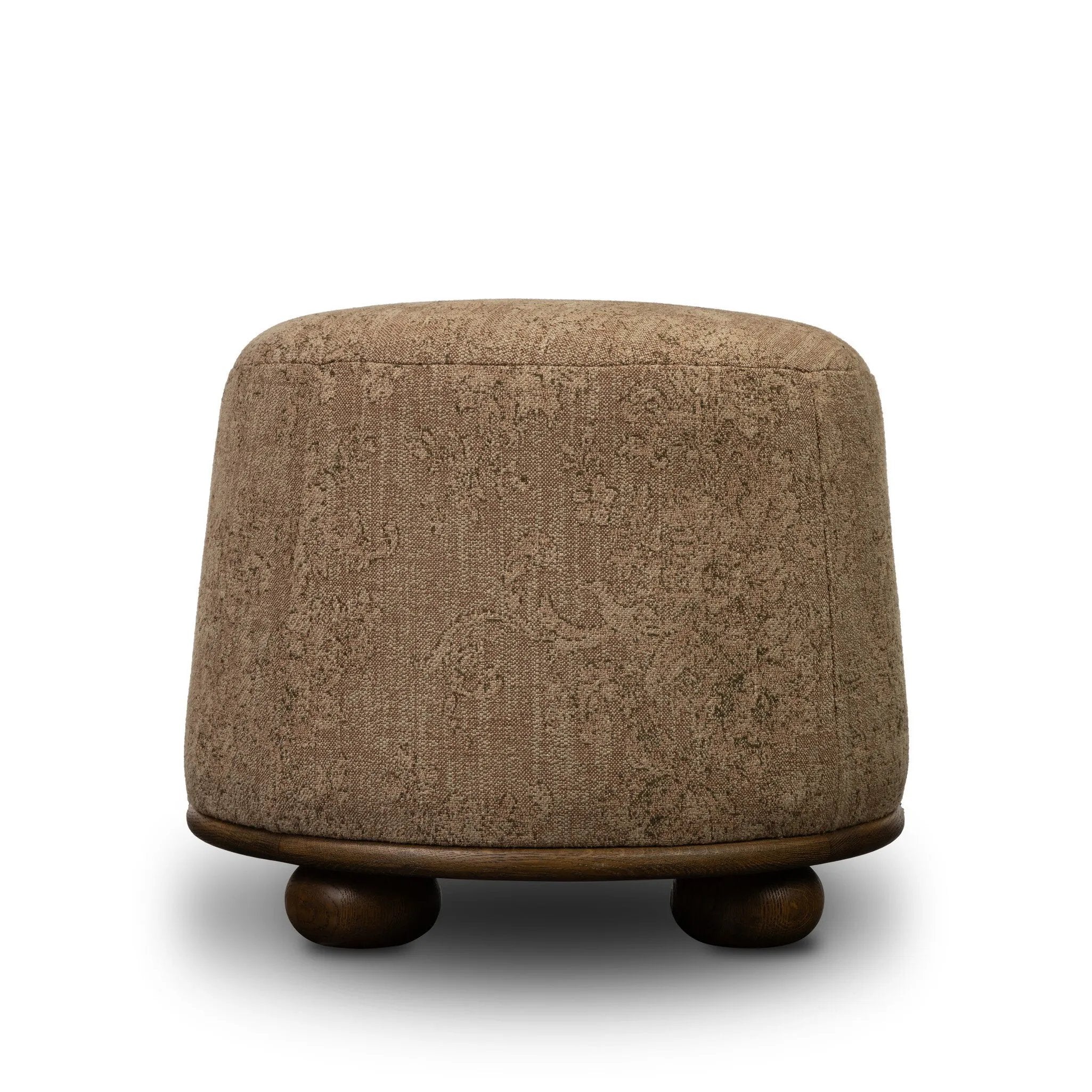 For an extra seat or propped feet, this welcoming ottoman features a subtly tapered shape and a rounded base with bun feet beneath. Crafted from almond-finished oak and upholstered with a linen blend fabric that features a beautiful damask pattern Amethyst Home provides interior design, new home construction design consulting, vintage area rugs, and lighting in the San Diego metro area.