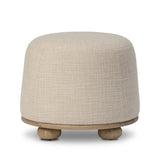 Featuring Bilbury Saxon Sand Ottoman by Four Hands at Amethyst Home. For an extra seat or propped feet, this welcoming ottoman features a subtly tapered shape and a rounded base with oak bun feet beneath. Crafted with soft foam cushioning and upholstered in a poly/wool blend fabric. Overall Dimensions: 22.00"w x 22.00"d x 18.50"h. Amethyst Home provides interior design, new home construction design consulting, vintage area rugs, and lighting in the Houston metro area.