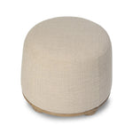 Featuring Bilbury Saxon Sand Ottoman by Four Hands at Amethyst Home. For an extra seat or propped feet, this welcoming ottoman features a subtly tapered shape and a rounded base with oak bun feet beneath. Crafted with soft foam cushioning and upholstered in a poly/wool blend fabric. Overall Dimensions: 22.00"w x 22.00"d x 18.50"h. Amethyst Home provides interior design, new home construction design consulting, vintage area rugs, and lighting in the Laguna Beach metro area.