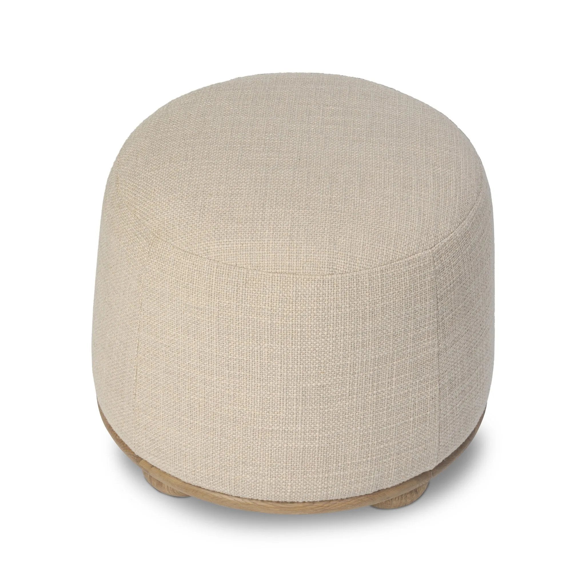 Featuring Bilbury Saxon Sand Ottoman by Four Hands at Amethyst Home. For an extra seat or propped feet, this welcoming ottoman features a subtly tapered shape and a rounded base with oak bun feet beneath. Crafted with soft foam cushioning and upholstered in a poly/wool blend fabric. Overall Dimensions: 22.00"w x 22.00"d x 18.50"h. Amethyst Home provides interior design, new home construction design consulting, vintage area rugs, and lighting in the Laguna Beach metro area.