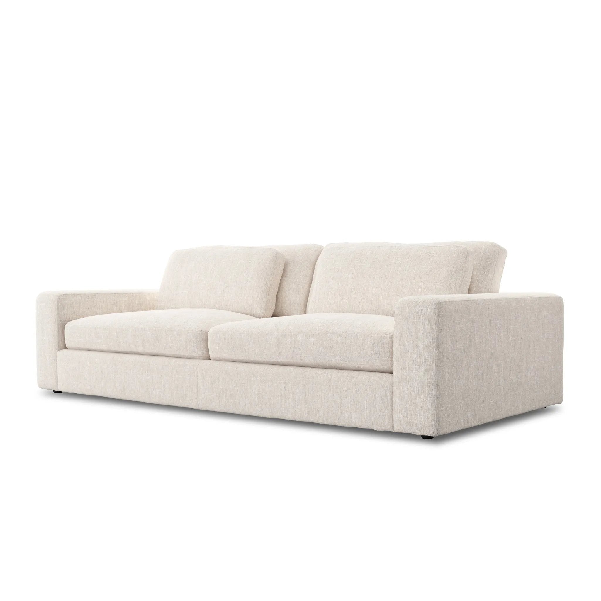 Featuring Bloor Essence Natural Sofa by Four Hands at Amethyst Home. Deep, modern and seductive. This dramatic, spacious sofa is covered in a durable light neutral woven fabric that mixes well with any color palette.Overall Dimensions: 98.00"w x 46.00"d x 31.00"hMaterials : 49% Viscose (Rayon), 22% Flax/Linen, 18% Polyester, 11% CottonWeight : 154.32 lbs. Amethyst Home provides interior design, new home construction design consulting, vintage area rugs, and lighting in the Charlotte metro area.