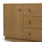 Fluid contours give shape to this solid mindi media console, topped with a creamy marbled top. Two doors with knobbed pulls and three drawers open to spacious storage Amethyst Home provides interior design, new home construction design consulting, vintage area rugs, and lighting in the Des Moines metro area.