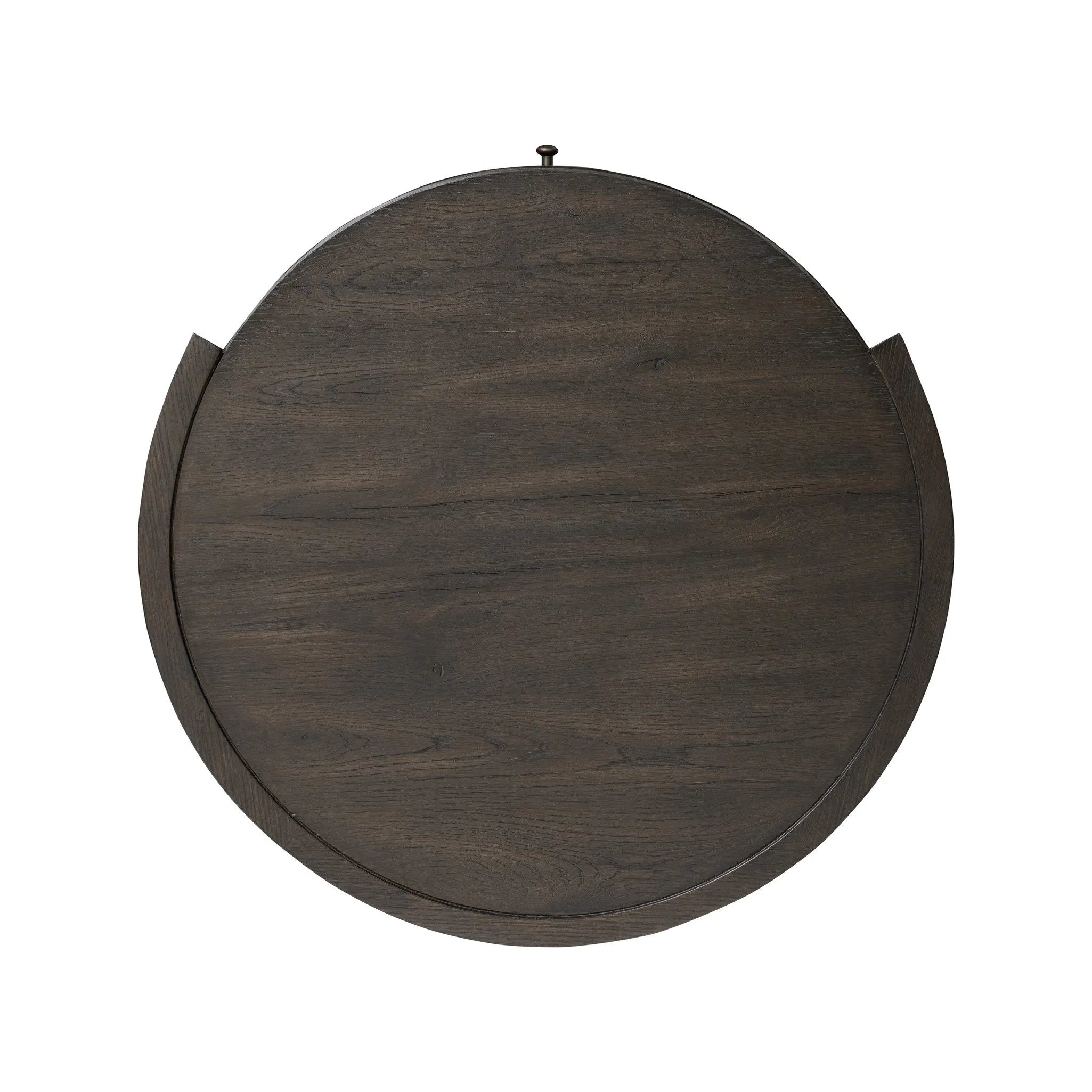 Rich contours bring character to the bedside. A round black-finished oak table has a spacious cubby and a single drawer with metal glides and a bronzed pull Amethyst Home provides interior design, new home construction design consulting, vintage area rugs, and lighting in the Kansas City metro area.