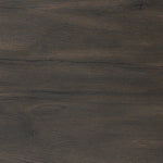 Rich contours bring character to the bedside. A round black-finished oak table has a spacious cubby and a single drawer with metal glides and a bronzed pull Amethyst Home provides interior design, new home construction design consulting, vintage area rugs, and lighting in the Monterey metro area.