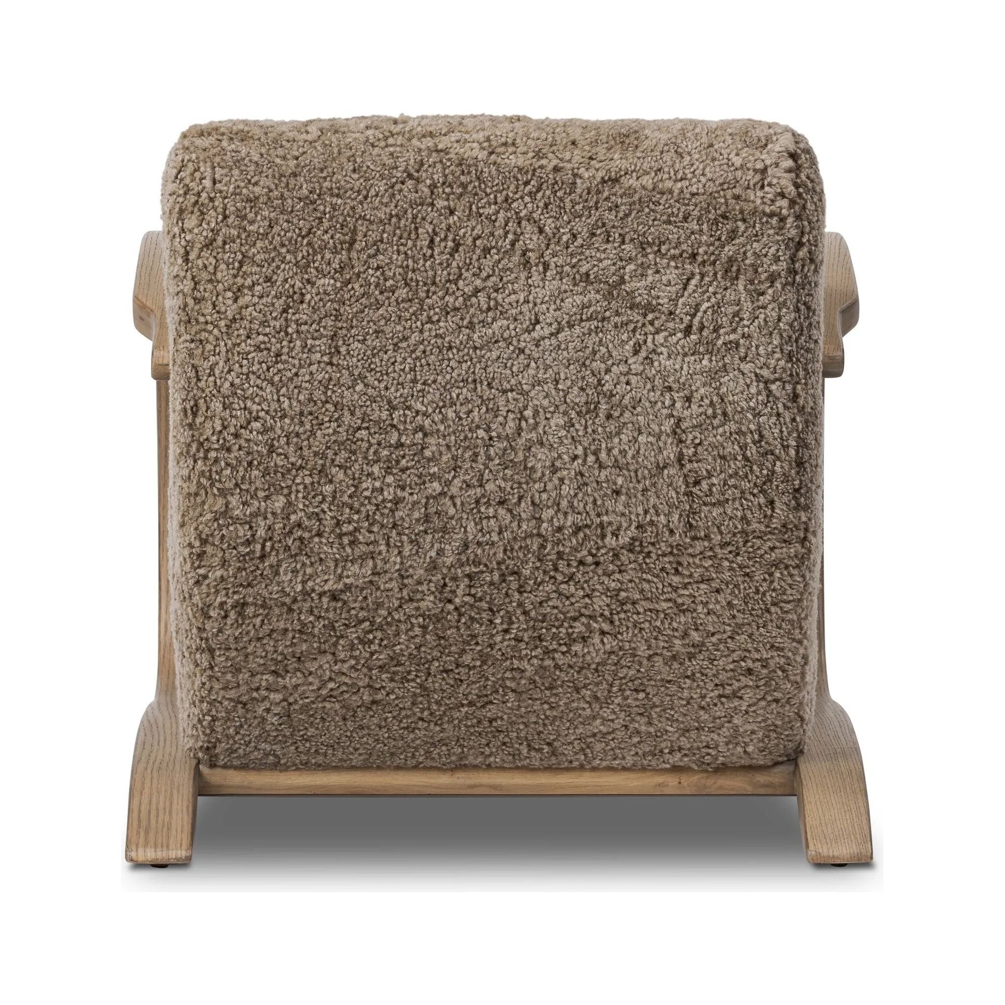 Soft texture and eye-catching contours fuse in this comfort-driven accent chair, pairing a low, luxurious shearling seat and