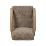 Soft texture and eye-catching contours fuse in this comfort-driven accent chair, pairing a low, luxurious shearling seat and