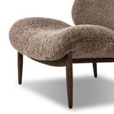 The perfect accent chair, designed for unwinding. Upholstered in a velvety olive chenille made from recycled materials, with wide proportions and cozy curves and cushioning. Slim, tapered wooden legs balance the look Amethyst Home provides interior design, new home construction design consulting, vintage area rugs, and lighting in the Newport Beach metro area.