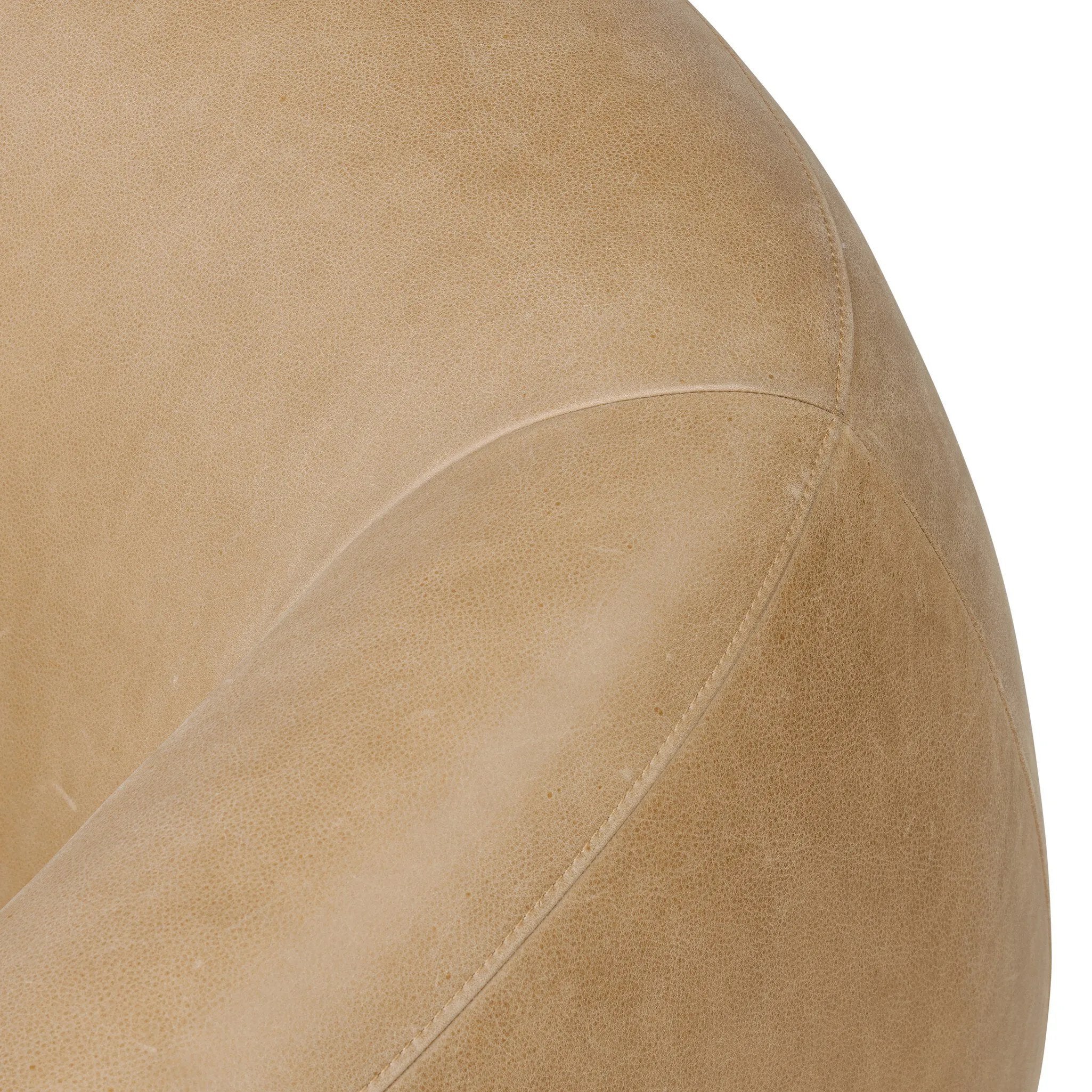 Meet modern comfort. Clean curves, impeccable tailoring and taupe top-grain leather with a pronounced grain bring an elevated, European-inspired look to this swivel chair Amethyst Home provides interior design, new home construction design consulting, vintage area rugs, and lighting in the Des Moines metro area.