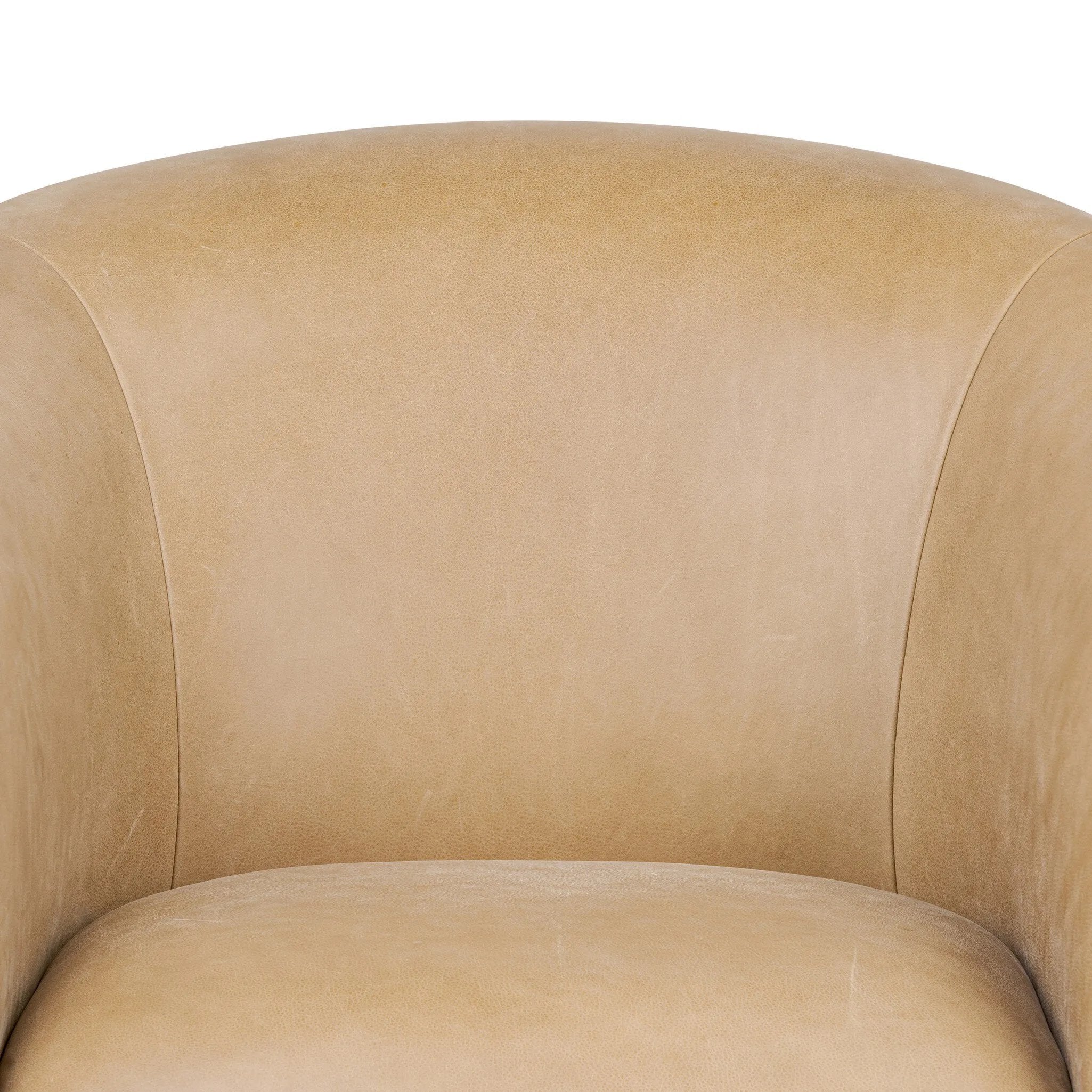 Meet modern comfort. Clean curves, impeccable tailoring and taupe top-grain leather with a pronounced grain bring an elevated, European-inspired look to this swivel chair Amethyst Home provides interior design, new home construction design consulting, vintage area rugs, and lighting in the Miami metro area.