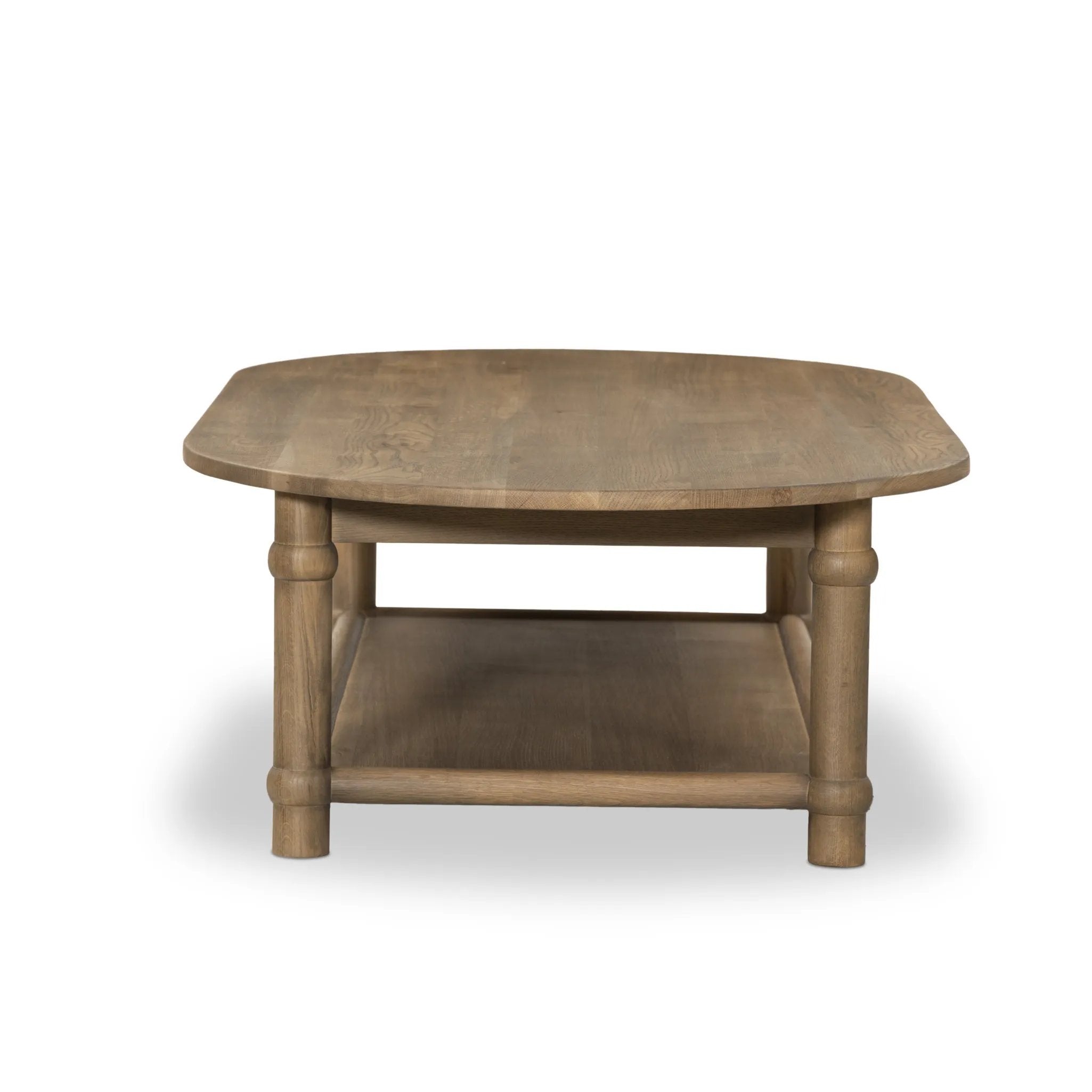 Crafted from warm, natural oak with natural antiquing. A rounded bullnose edge and the lower shelf add functionality, while the round ball details provide a crafted finish. A design collaboration by Amber Lewis and Four Hands. This item has limited online distribution and may not be sold on websites without prior approval. Amethyst Home provides interior design, new home construction design consulting, vintage area rugs, and lighting in the Winter Garden metro area.