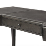 Featuring Claude Distressed Black Oak Veneer Desk by Four Hands at Amethyst Home. This refreshed directoire-style desk pairs a 100% top-grain leather inset top with a unique reverse breakfront and recessed center drawer. Finished in distressed black oak, it offers the workspace a classic yet updated feel.
Overall Dimensions: 28.0" L x 68.0 " W x 30.0" H
Mat. Amethyst Home provides interior design, new home construction design consulting, vintage area rugs, and lighting in the Charlotte metro area.
