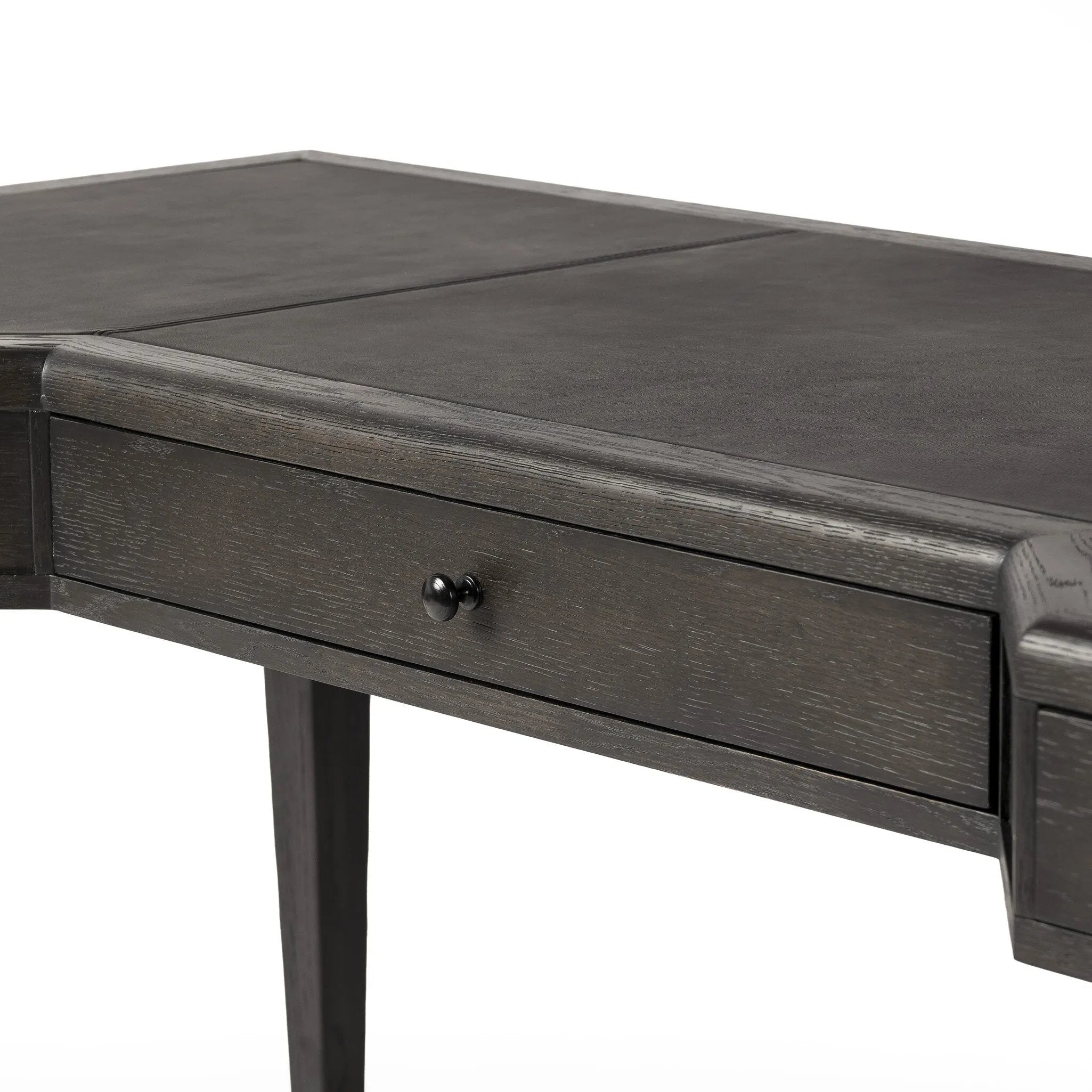 Featuring Claude Distressed Black Oak Veneer Desk by Four Hands at Amethyst Home. This refreshed directoire-style desk pairs a 100% top-grain leather inset top with a unique reverse breakfront and recessed center drawer. Finished in distressed black oak, it offers the workspace a classic yet updated feel.
Overall Dimensions: 28.0" L x 68.0 " W x 30.0" H
Mat. Amethyst Home provides interior design, new home construction design consulting, vintage area rugs, and lighting in the Charlotte metro area.