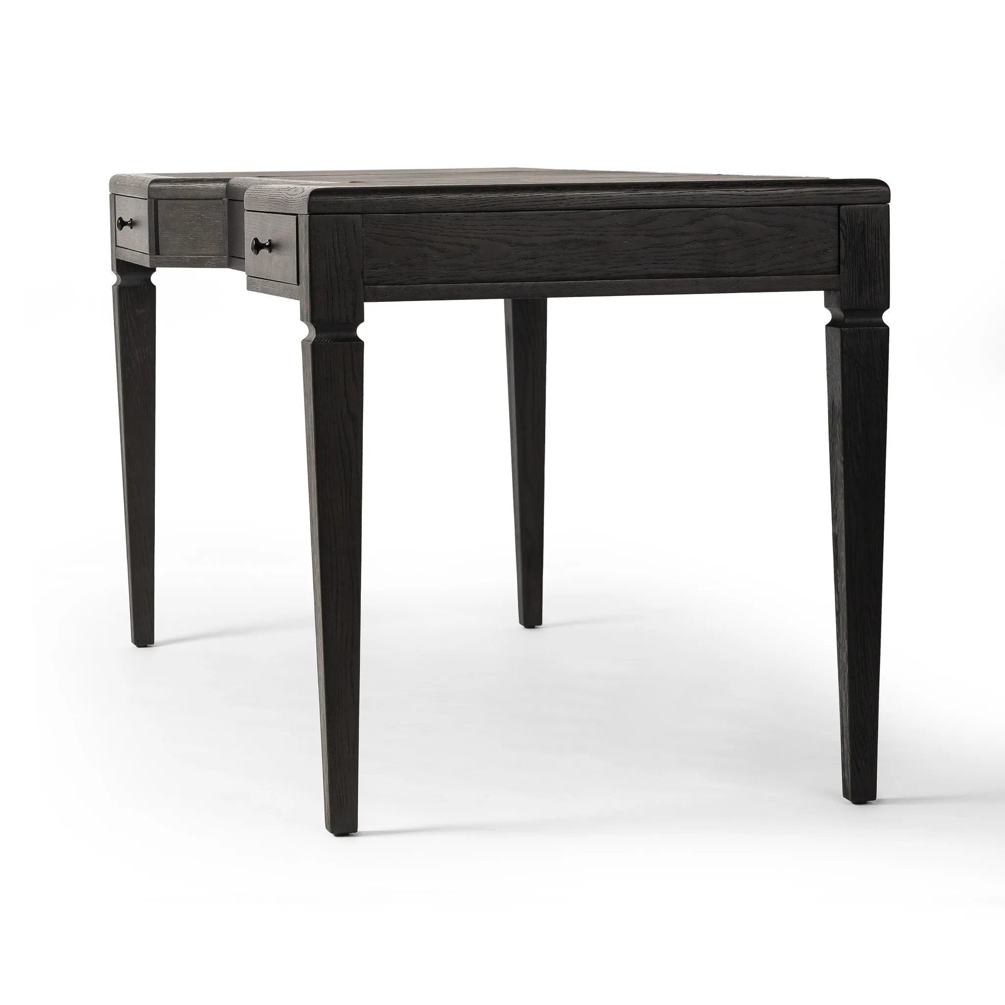 Featuring Claude Distressed Black Oak Veneer Desk by Four Hands at Amethyst Home. This refreshed directoire-style desk pairs a 100% top-grain leather inset top with a unique reverse breakfront and recessed center drawer. Finished in distressed black oak, it offers the workspace a classic yet updated feel.
Overall Dimensions: 28.0" L x 68.0 " W x 30.0" H
Materi. Amethyst Home provides interior design, new home construction design consulting, vintage area rugs, and lighting in the Dallas metro area.