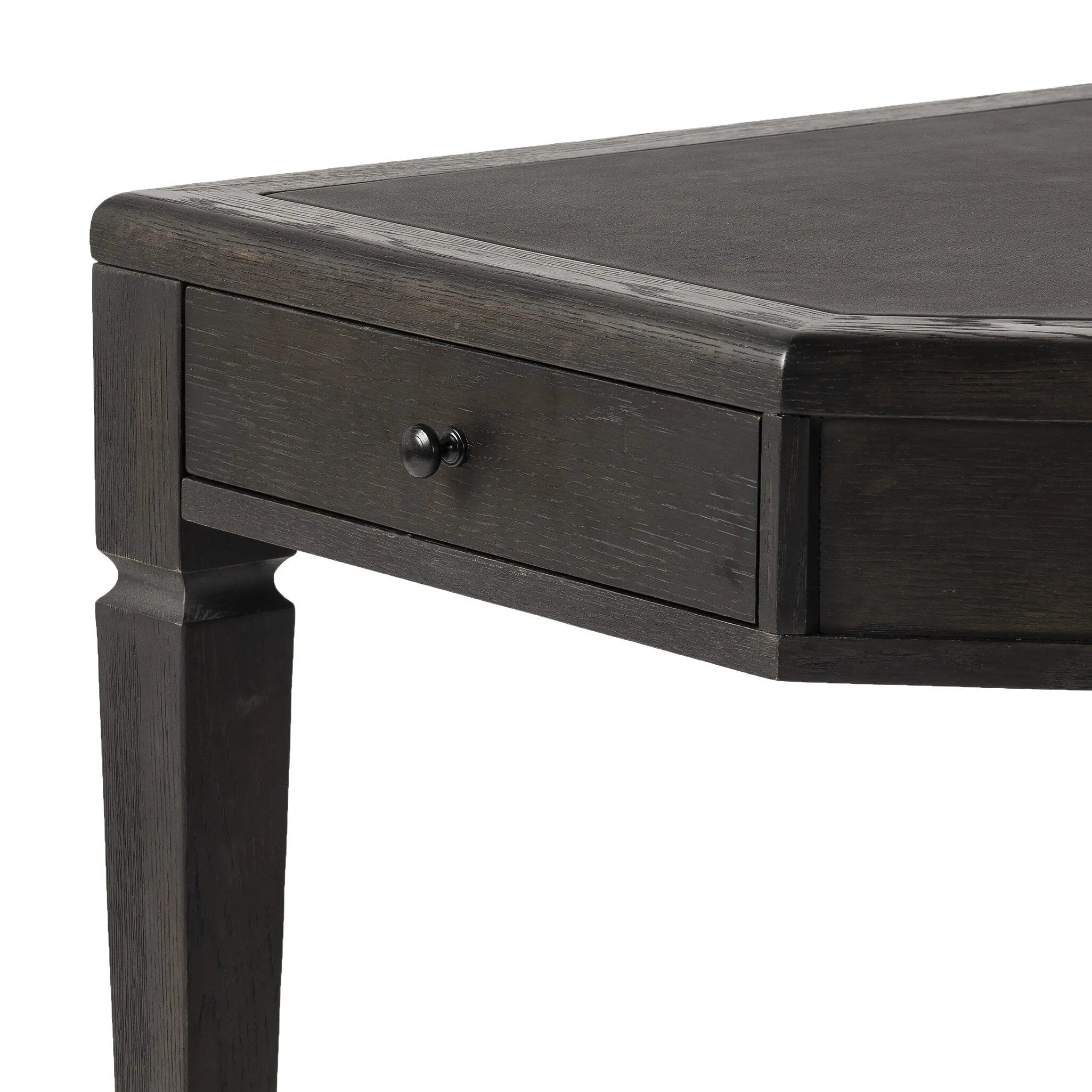 Featuring Claude Distressed Black Oak Veneer Desk by Four Hands at Amethyst Home. This refreshed directoire-style desk pairs a 100% top-grain leather inset top with a unique reverse breakfront and recessed center drawer. Finished in distressed black oak, it offers the workspace a classic yet updated feel.
Overall Dimensions: 28.0" L x 68.0 " W x 30.0" H
Materia. Amethyst Home provides interior design, new home construction design consulting, vintage area rugs, and lighting in the Miami metro area.