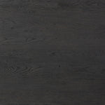 Bring a beautifully contoured look to your workspace with a desk inspired by Italian postmodernism. Connected by iron brackets, a dual-panel base supports a spacious tabletop of worn black oak, crafting a float-like look. Four drawers keep frequently used items within reach Amethyst Home provides interior design, new home construction design consulting, vintage area rugs, and lighting in the Seattle metro area.