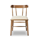 Featuring Colter Antwerp Natural Dining Chair by Four Hands at Amethyst Home. Made from solid ash with an amber finish, this versatile dining chair pairs an airy back with tapered spindles, for a simple, inviting look. Fixed upholstered seat of high-performance fabric adds a smart, comfortable touch. Performance fabrics are specially created to withstand spills. Amethyst Home provides interior design, new home construction design consulting, vintage area rugs, and lighting in the Tampa metro area.