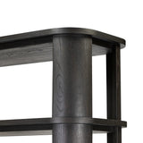 Unexpected contours give this bookcase its warm, modern vibe. Crafted oak veneer with a worn black finish, rounded legs are inset from the shelves with a plinth-like effect Amethyst Home provides interior design, new home construction design consulting, vintage area rugs, and lighting in the Seattle metro area.