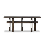 Featuring Contessa Smoked Alder Console Table by Four Hands at Amethyst Home. Crafted from smoked alder, this Wabi Sabi-inspired console brings an organic look to your space. With staggered legs, chamfered edges and a central stretcher, this piece is perfect for media display or styled in the living room or entryway. Overall Dimensions: 78.00"w x 17.75"d . Amethyst Home provides interior design, new home construction design consulting, vintage area rugs, and lighting in the Los Angeles metro area.