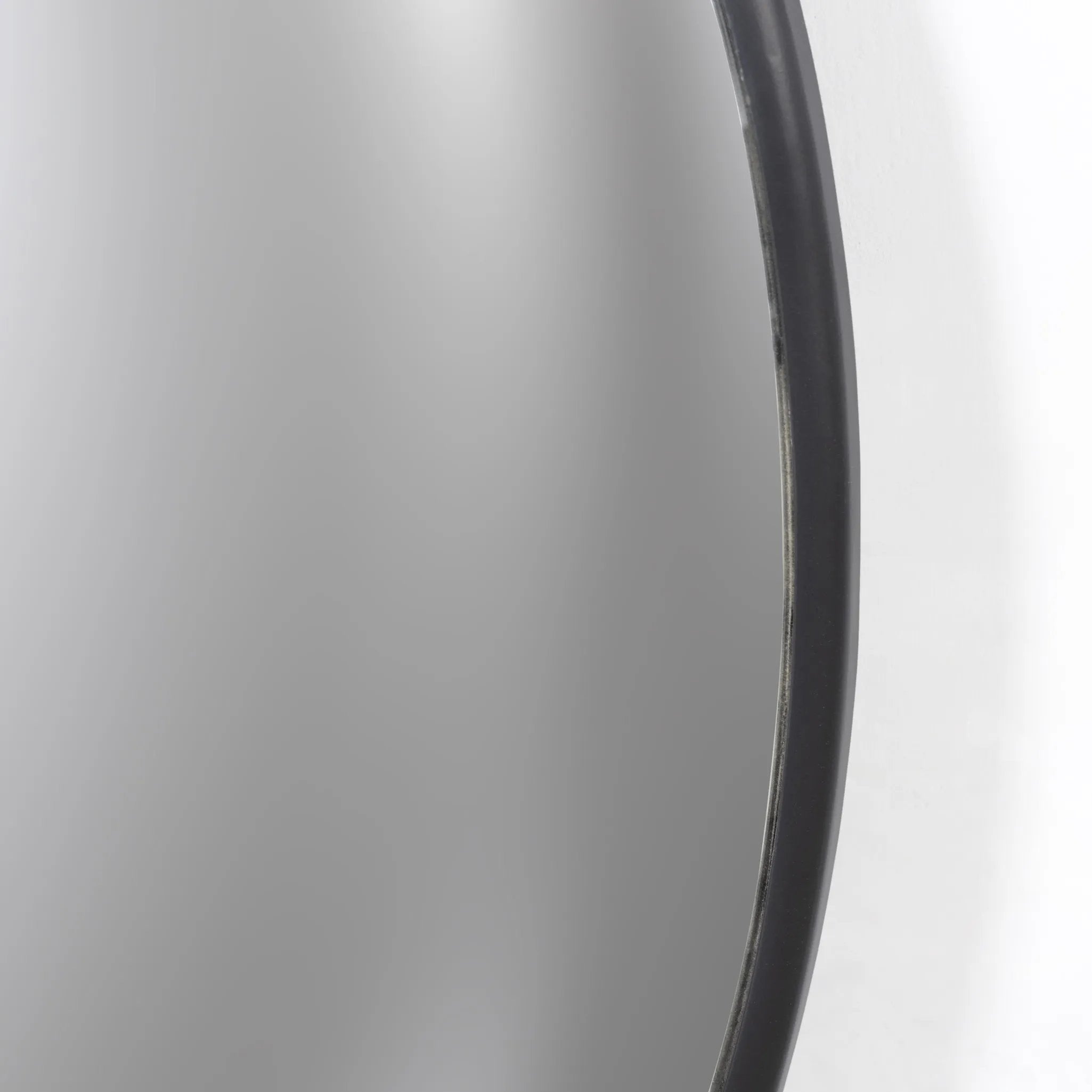 Featuring Convex Iron Matte Black Wall Mirror by Four Hands at Amethyst Home. A slim frame in black-finished iron cradles this oversized mirror's convex curve. Bold yet refined, it amplifies space and light as a captivating focal point.Overall Dimensions: 46.50"w x 5.00"d x 46.50"hWeight : 56.31 lbsMaterials : Iron. Amethyst Home provides interior design, new home construction design consulting, vintage area rugs, and lighting in the Houston metro area.