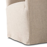 Featuring Cove Laine Navy Dining Chair With Casters by Four Hands at Amethyst Home. A polished form with curved lines and upholstered in a flax/linen blend, this chair brings quiet sophistication to the dining room. Functional casters allow easy movement. This item has limited online distribution and may not be sold on websites without prior approval.Ove. Amethyst Home provides interior design, new home construction design consulting, vintage area rugs, and lighting in the Laguna Beach metro area.