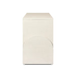 Talk about novelty. Made from painted linen in a light ivory, arched legs soften otherwise clean, modern shaping. Finished in