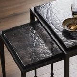 Featuring Dexter Smoked Black Cast Glass Nesting Tables by Four Hands at Amethyst Home. Embrace the mysterious with the Dexter smoked glass nesting tables.  Beautiful smoked glass gives a warm modern vibe while being practical.Overall Dimensions: 16.25"w x 16.25"d x 21.00"hWeight : 52.91 lbsMaterials : Cast Glass, Iron. Amethyst Home provides interior design, new home construction design consulting, vintage area rugs, and lighting in the Omaha metro area.