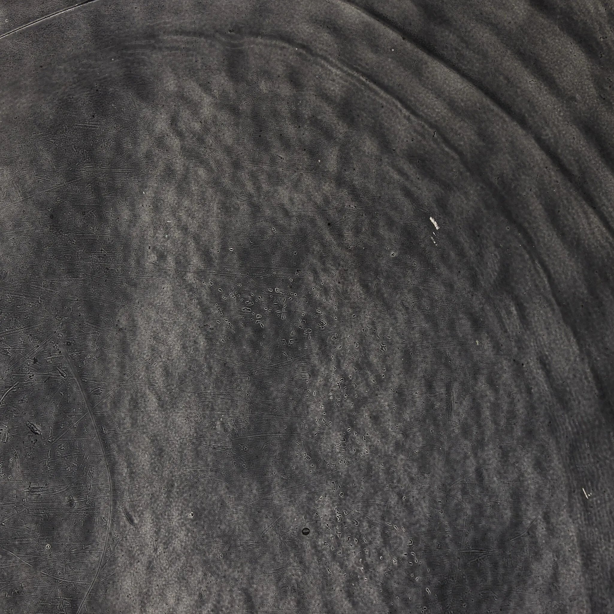 Featuring Dexter Smoked Black Cast Glass Nesting Tables by Four Hands at Amethyst Home. Embrace the mysterious with the Dexter smoked glass nesting tables.  Beautiful smoked glass gives a warm modern vibe while being practical.Overall Dimensions: 16.25"w x 16.25"d x 21.00"hWeight : 52.91 lbsMaterials : Cast Glass, Iron. Amethyst Home provides interior design, new home construction design consulting, vintage area rugs, and lighting in the Park City metro area.