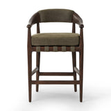 Featuring Dane Broadway Olive Stool by Four Hands at Amethyst Home. Traditional safari styling is brought to modern speed. A solid wood frame features a webbed seating structure that brings a supported, sink-in feel to the entire piece. The upholstered back, strap details and loose cushion are finished in an olive flax/linen-blend fabric. Perfectly sized fo. Amethyst Home provides interior design, new home construction design consulting, vintage area rugs, and lighting in the Park City metro area.