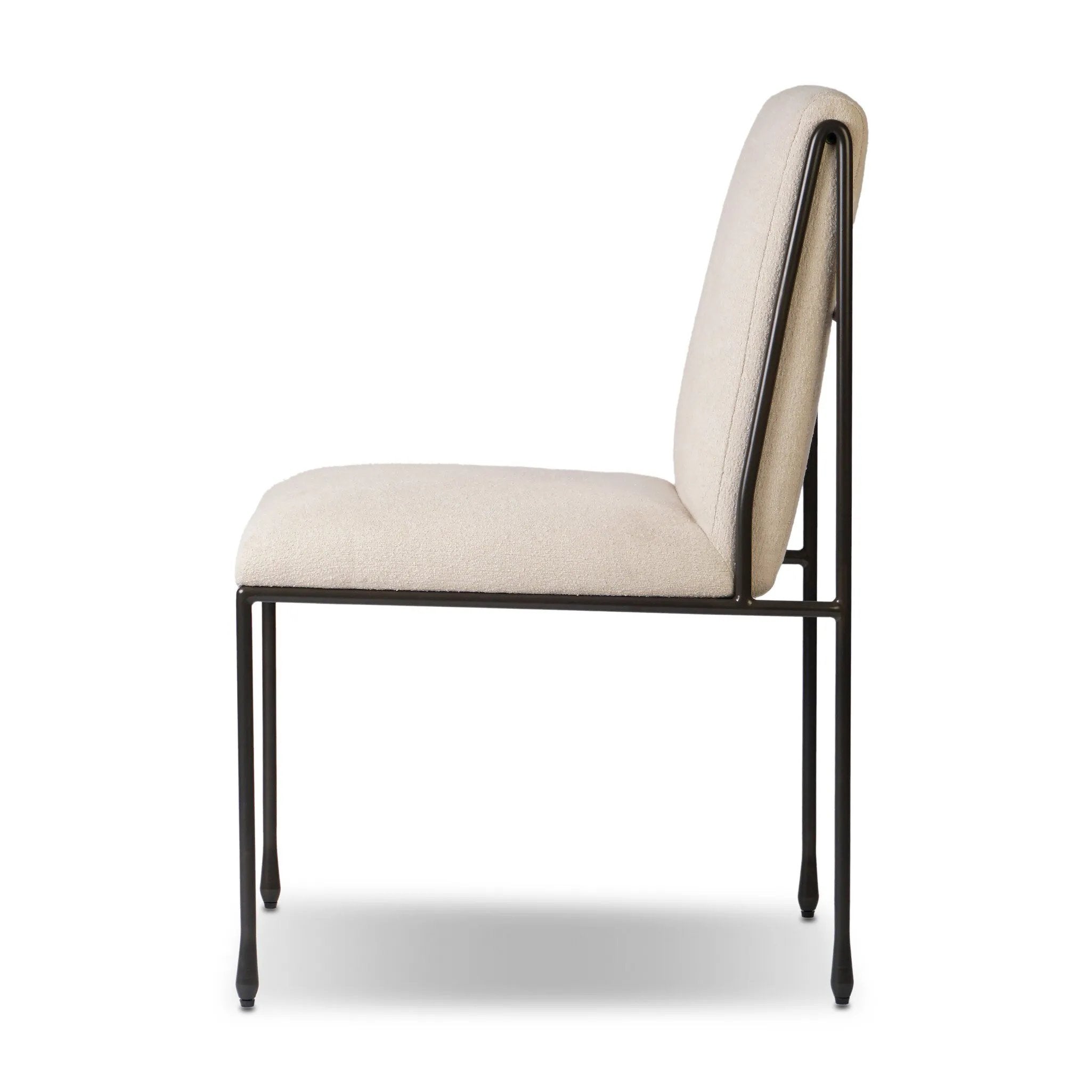 European inspiration gives streamlined character to this high-back metal-framed dining chair. Bent metal detail and tapered feet add interesting elements. Supported with upholstered seating in snow-white Crypton® performance fabric. Crypton® fabric is specially engineered for protection against stains, moisture and odor Amethyst Home provides interior design, new home construction design consulting, vintage area rugs, and lighting in the Portland metro area.