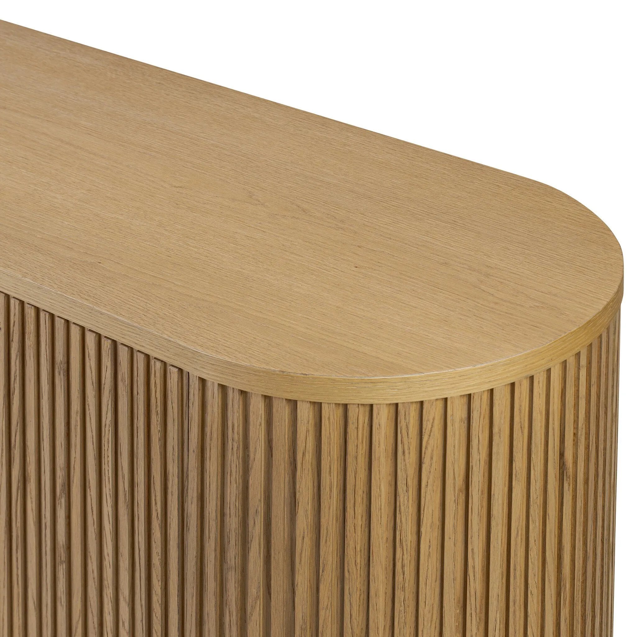 Crafted from desert oak solids and veneers with a plinth-style base, rounded sides and linear reeding, this sideboard exudes midcentury vibes. Fully finished interior and shelves for quality detailing inside and out Amethyst Home provides interior design, new home construction design consulting, vintage area rugs, and lighting in the Winter Garden metro area.