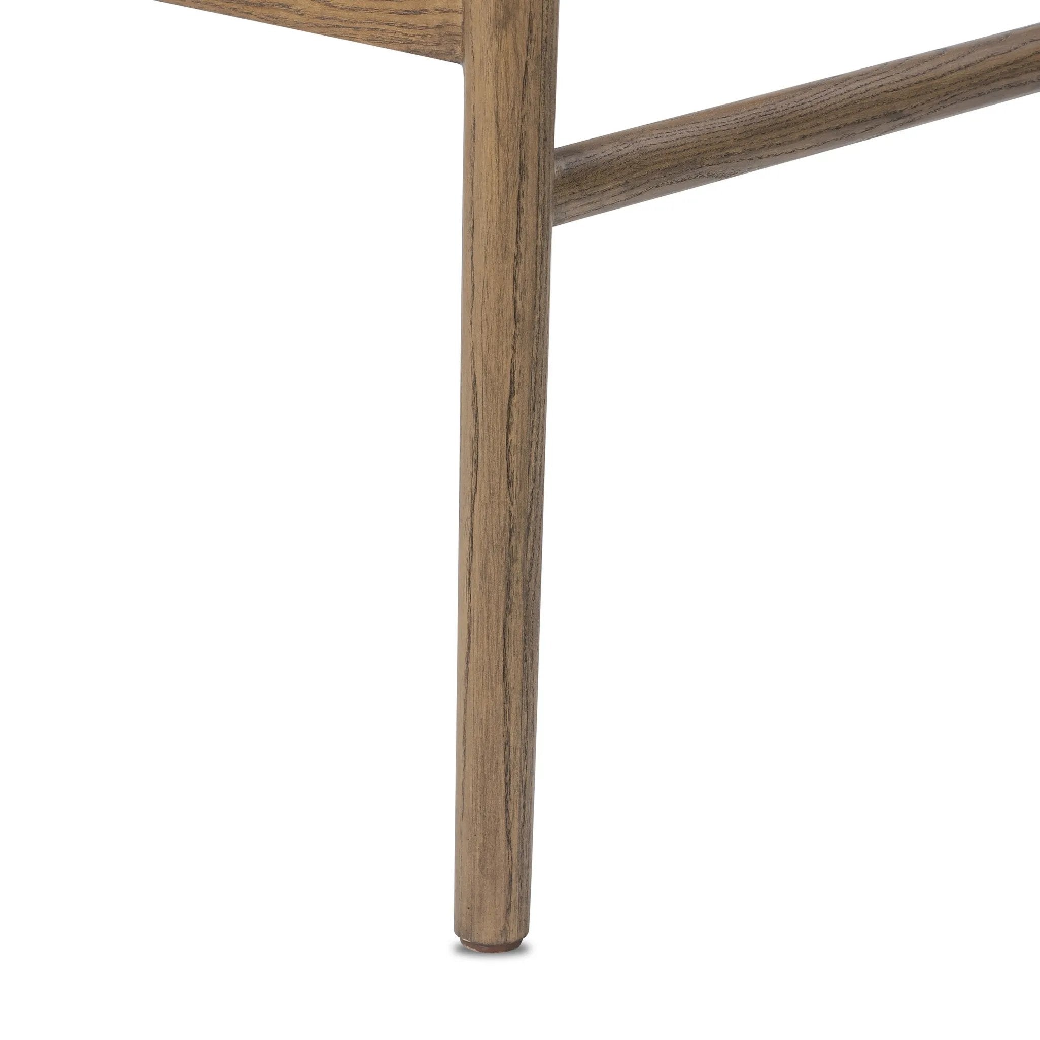 A tribute to traditional artistry and found pieces, this bar stool fluidly combines ash and burnished brass to frame a comfortable S-spring seat. Finished in heavy boucle-like upholstery that features a subtle linear pattern for added depth — creating a luxe, inviting feel. A design collaboration by Amber Lewis and Four Hands. Amethyst Home provides interior design, new home construction design consulting, vintage area rugs, and lighting in the Des Moines metro area.