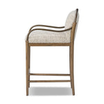 A tribute to traditional artistry and found pieces, this bar stool fluidly combines ash and burnished brass to frame a comfortable S-spring seat. Finished in heavy boucle-like upholstery that features a subtle linear pattern for added depth — creating a luxe, inviting feel. A design collaboration by Amber Lewis and Four Hands. Amethyst Home provides interior design, new home construction design consulting, vintage area rugs, and lighting in the Los Angeles metro area.