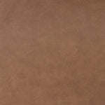 Slightly scooped top-grain leather tufting is bridged with metal bars in brushed brass for modern detailing. Aged smoked oak