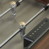 Streamlined for fun. This foosball table features a concrete playing surface and distinctly detailed players in cast aluminum. Rounded square wooden handles and cylindrical metal score counters tie together the sleek, industrial look of this foosball table, finished with tapered cast aluminum legs. Amethyst Home provides interior design, new home construction design consulting, vintage area rugs, and lighting in the Monterey metro area.