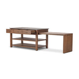A kitchen island and waterfall dining table in one. Crafted from oak, the island system features two large shelves and three drawers on each side, all topped with by warm grey marble. The pullout table extends and fits inside the frame with ease Amethyst Home provides interior design, new home construction design consulting, vintage area rugs, and lighting in the Winter Garden metro area.