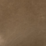 A modernized midcentury silhouette meets the traditional Chesterfield sofa, all in a compact profile perfect for smaller spaces. Top-grain leather in a tan hue, button tufting and a smooth touch bring deep comfort to lounging Amethyst Home provides interior design, new home construction design consulting, vintage area rugs, and lighting in the Seattle metro area.