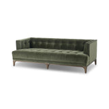 A modernized midcentury silhouette meets the traditional Chesterfield sofa, all in a compact profile perfect for smaller spaces. Smooth velvet in an olive hue, button tufting and a soft touch bring deep comfort to lounging Amethyst Home provides interior design, new home construction design consulting, vintage area rugs, and lighting in the Monterey metro area.
