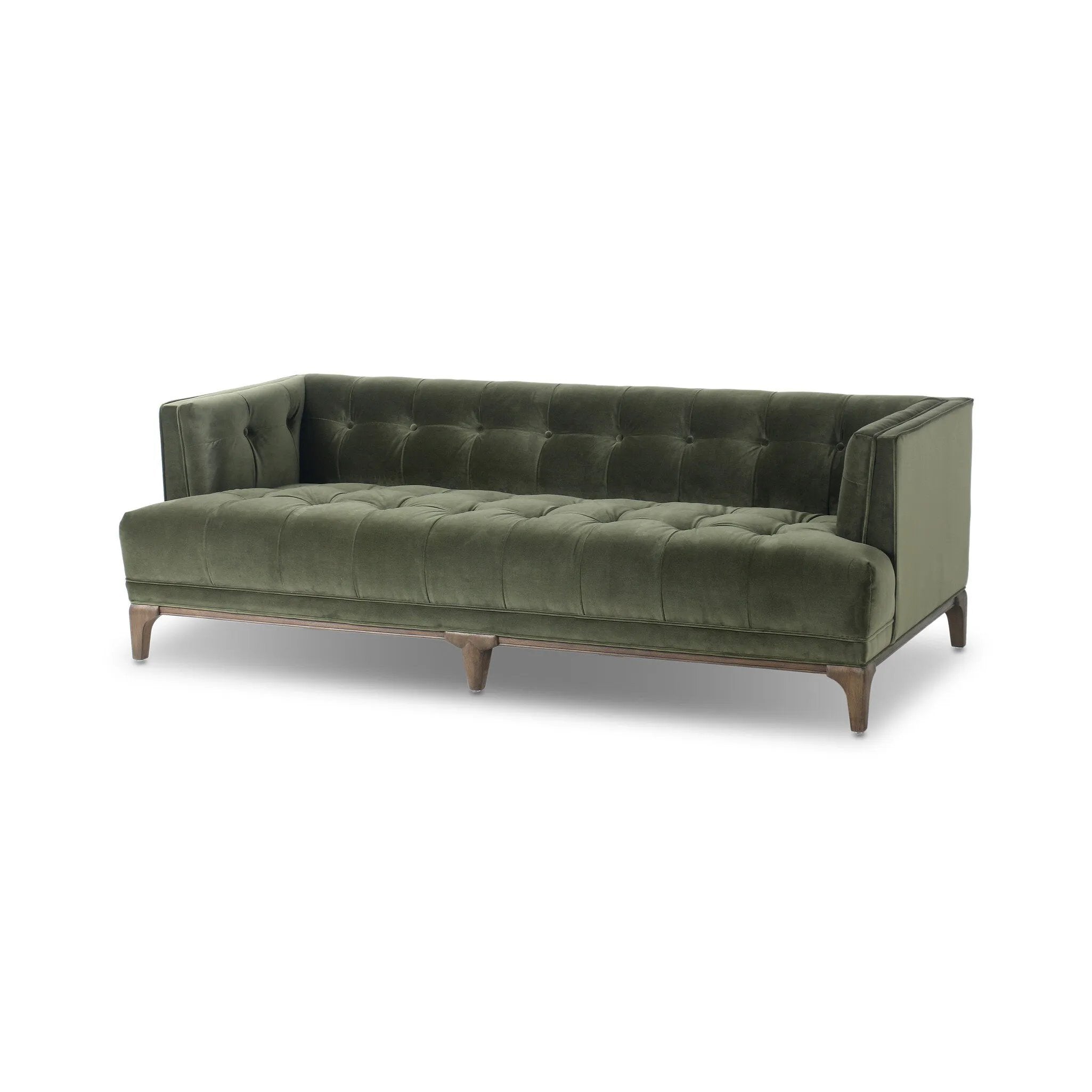 A modernized midcentury silhouette meets the traditional Chesterfield sofa, all in a compact profile perfect for smaller spaces. Smooth velvet in an olive hue, button tufting and a soft touch bring deep comfort to lounging Amethyst Home provides interior design, new home construction design consulting, vintage area rugs, and lighting in the Monterey metro area.
