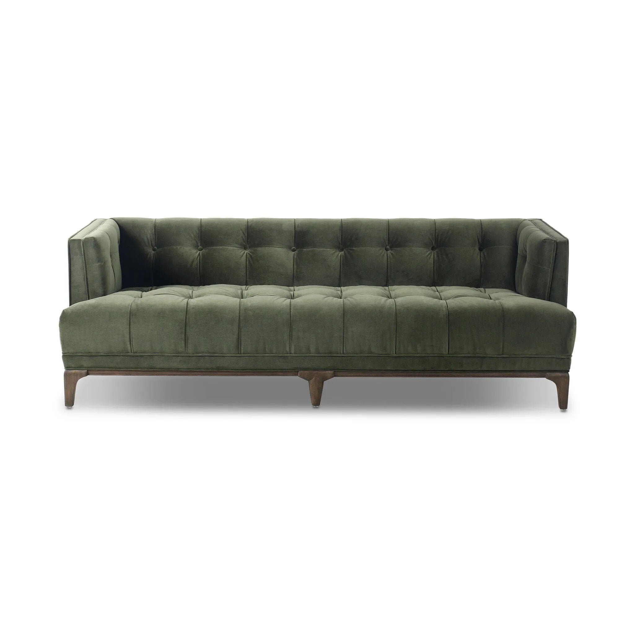 A modernized midcentury silhouette meets the traditional Chesterfield sofa, all in a compact profile perfect for smaller spaces. Smooth velvet in an olive hue, button tufting and a soft touch bring deep comfort to lounging Amethyst Home provides interior design, new home construction design consulting, vintage area rugs, and lighting in the Nashville metro area.