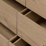 Simple and spacious, this oak dresser has six drawers paired with aged bronze and wood hardware. Waterfall shaping and soft-close undermount glides give a smooth finish Amethyst Home provides interior design, new home construction design consulting, vintage area rugs, and lighting in the Houston metro area.