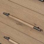 Simple and spacious, this oak dresser has six drawers paired with aged bronze and wood hardware. Waterfall shaping and soft-close undermount glides give a smooth finish Amethyst Home provides interior design, new home construction design consulting, vintage area rugs, and lighting in the Washington metro area.