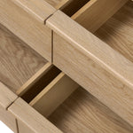 Built from thick-cut oak and veneers with an aged smoked finish, this farmhouse-inspired eight-drawer dresser features softened edges, fastening details, integrated wood hardware and soft-close drawer glides for quality construction Amethyst Home provides interior design, new home construction design consulting, vintage area rugs, and lighting in the Park City metro area.